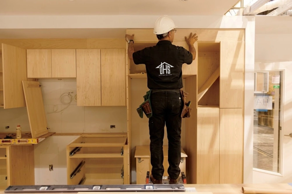 Professional carpenter working with wood